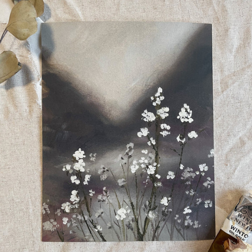 A serene floral painting with white blossoms against a moody sky, representing creative artwork perfect for holiday gifting